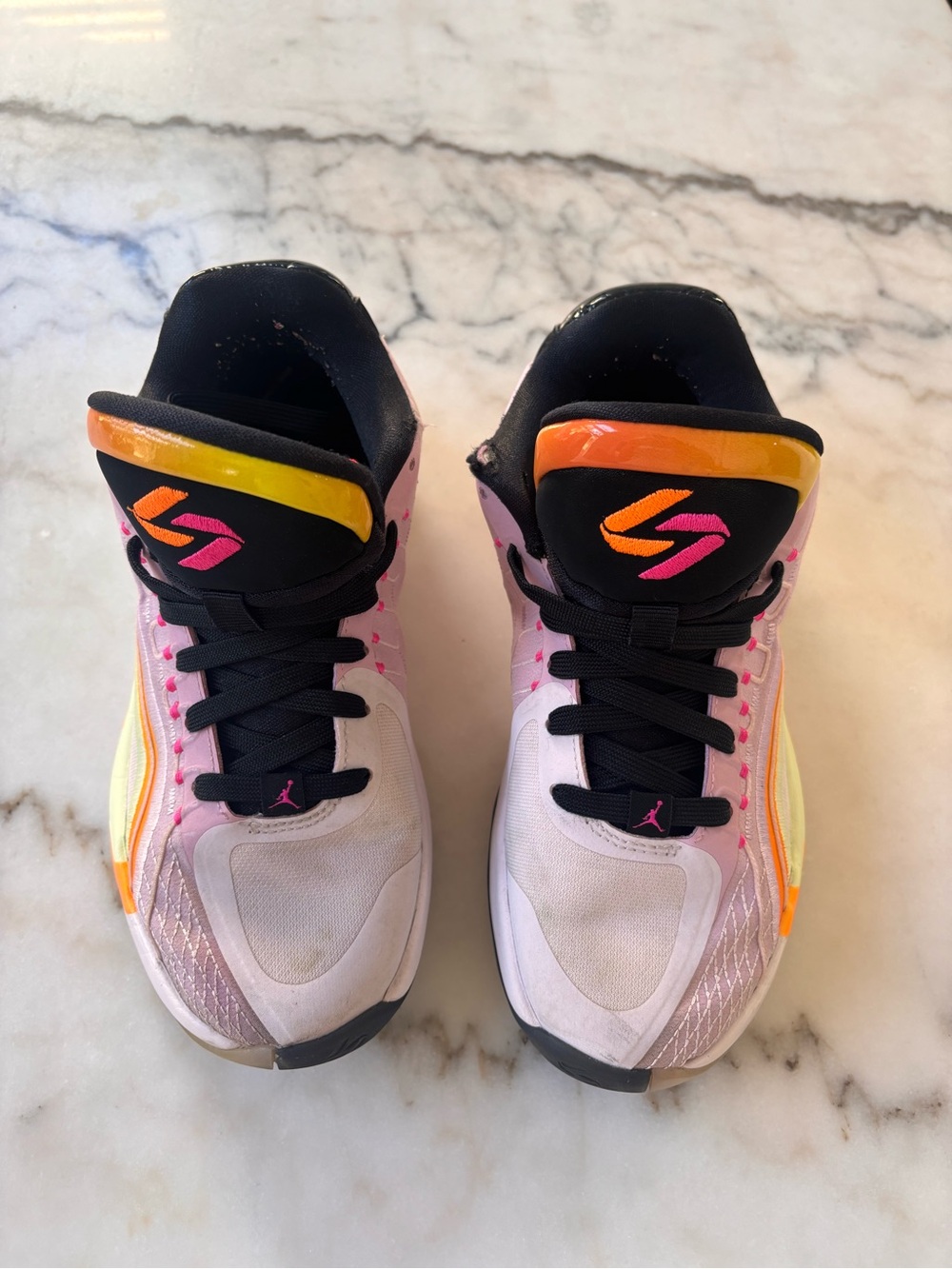Jordan Women’s Pink Sneakers with Neon Orange and Yellow Accents